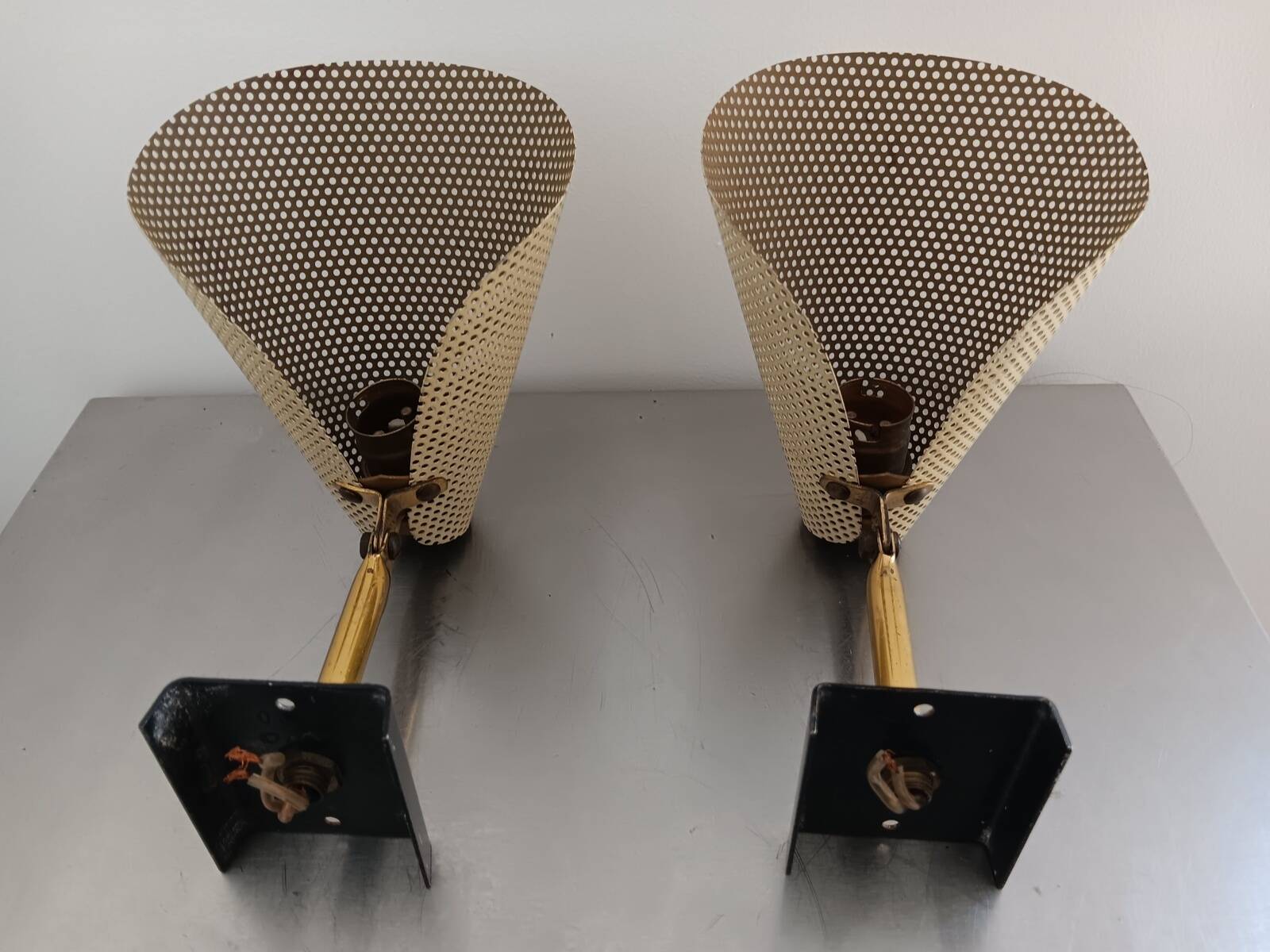 Pair of perforated metal horn wall lights