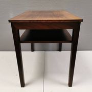 Nice side table in rosewood, probably Danish and from the 60s.
