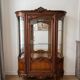 Louis XV display cabinet ensemble in solid brown wood.