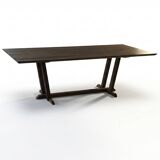 Exceptional dining table in solid walnut.