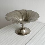 large dish on a shiny metal stand