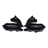 Black marble bookends with lying horses