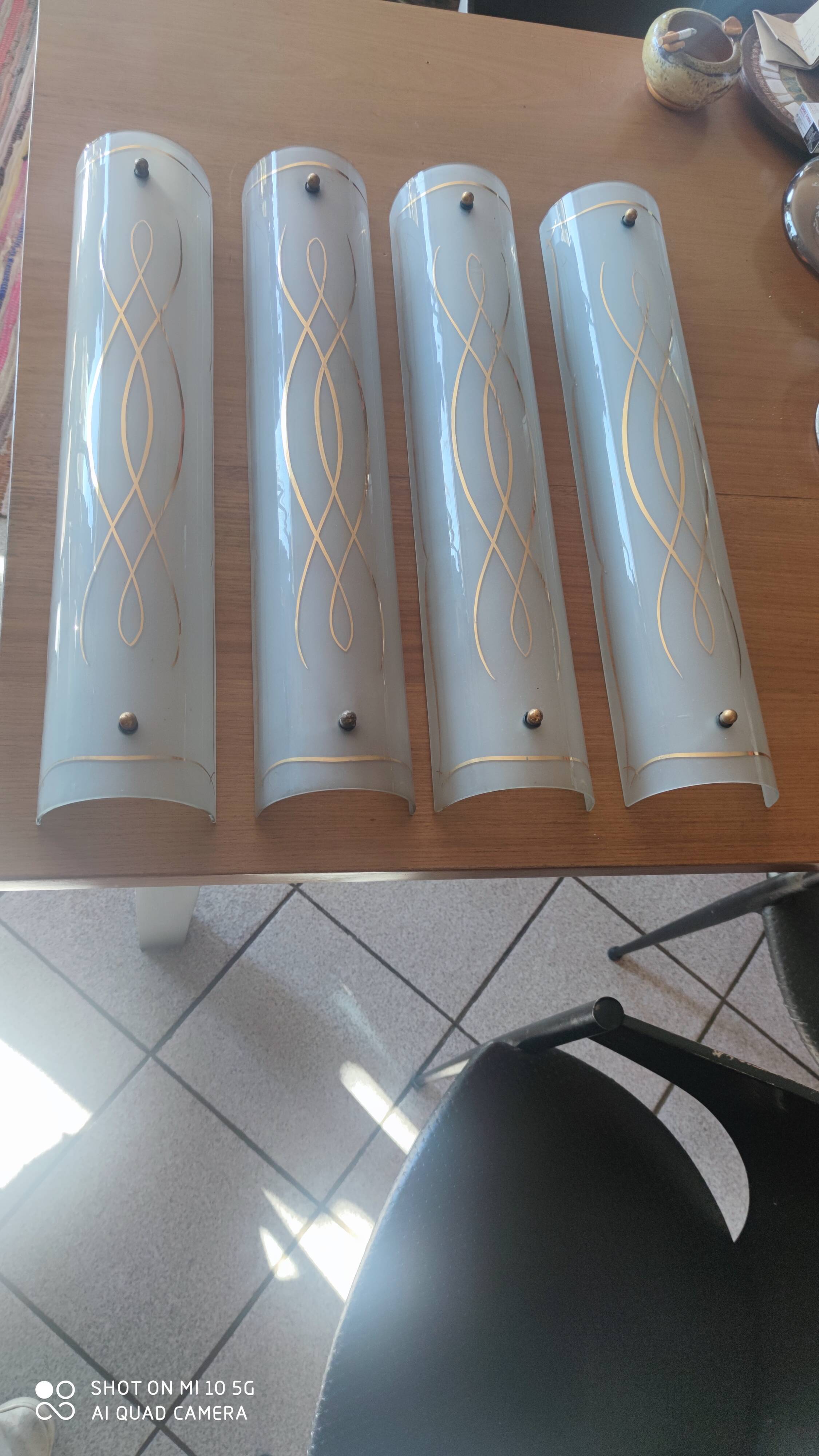 Set of 4 glass wall sconces circa 1940