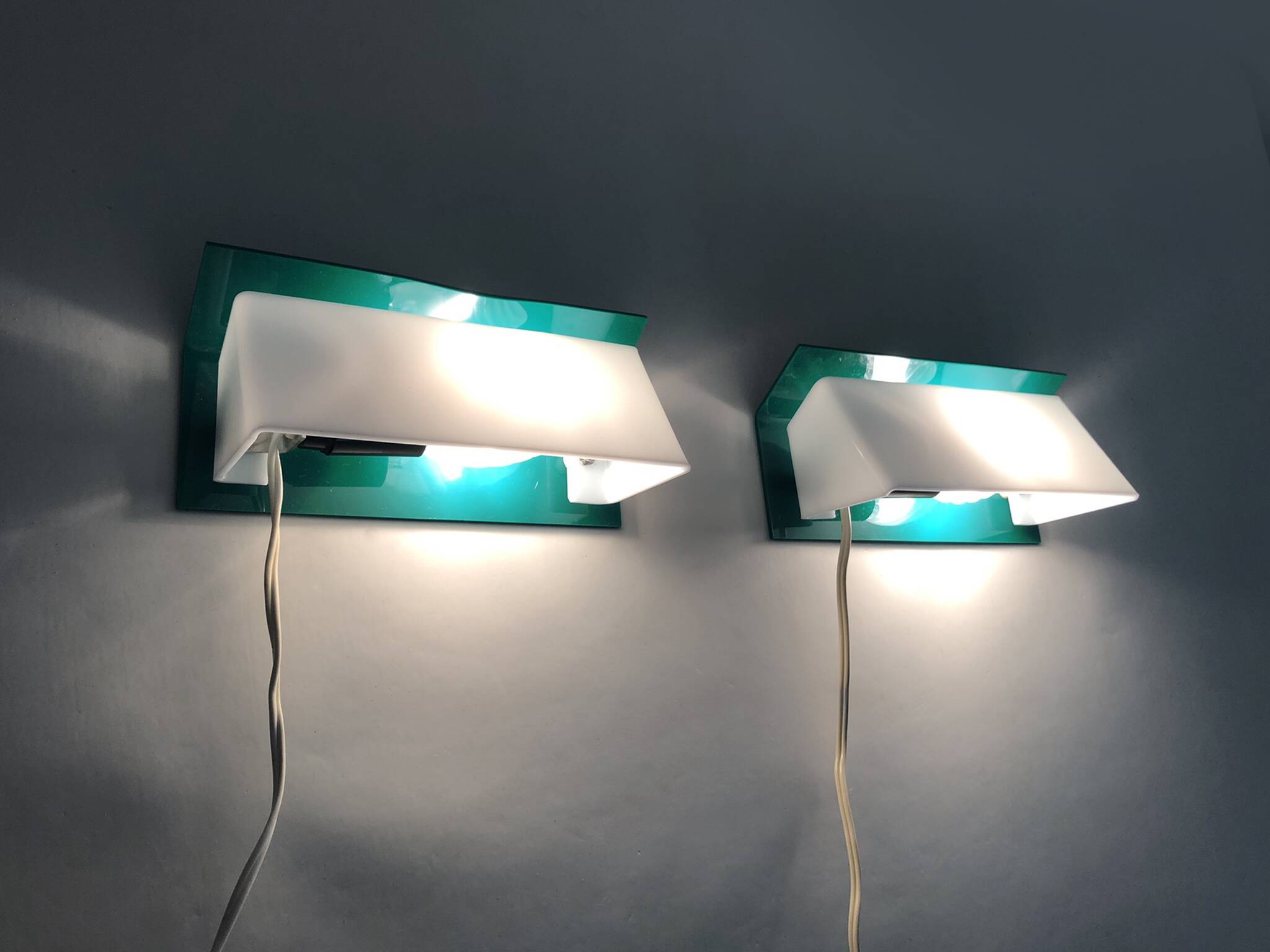 Pair of wall sconces with Scandinavian green and white shutters. 1980s.