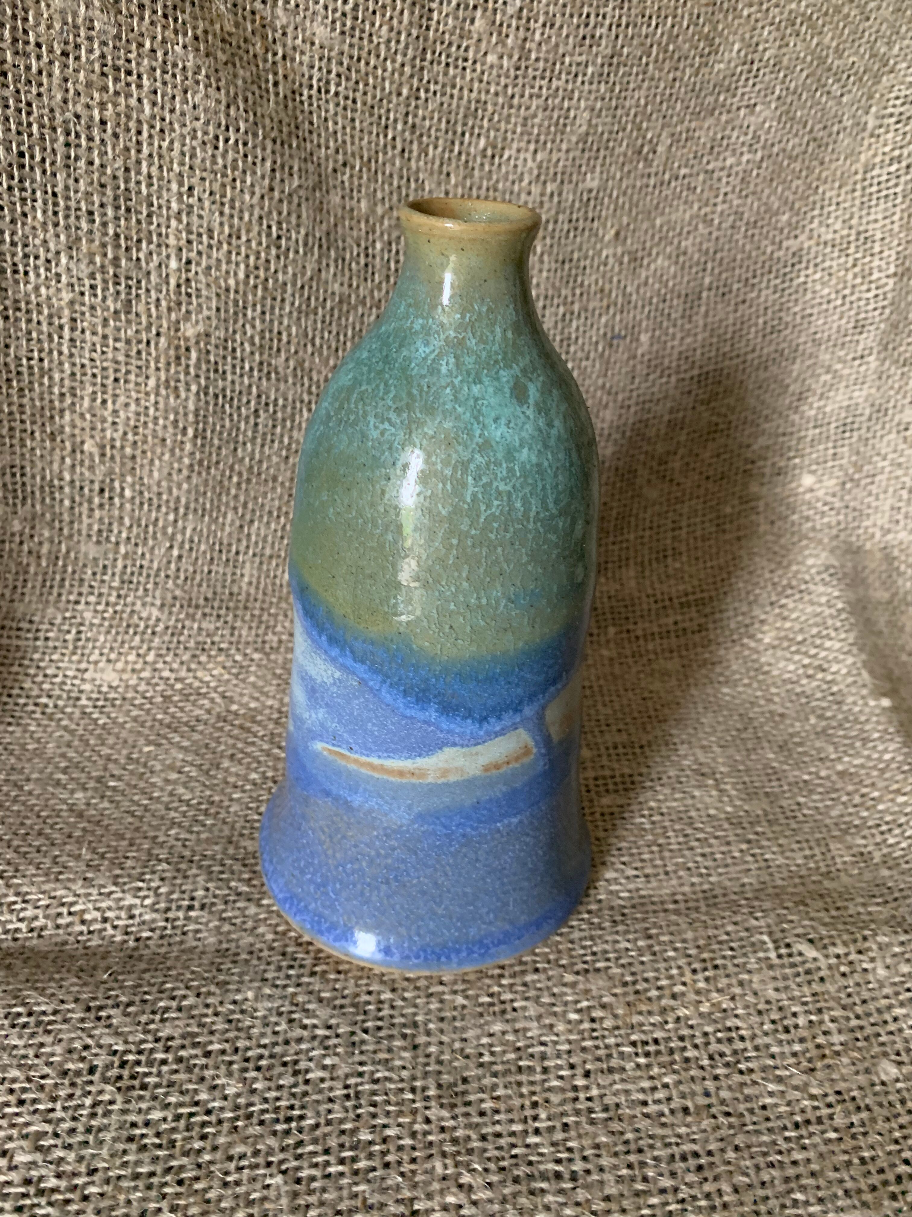 Vase in blue enamelled sandstone sign