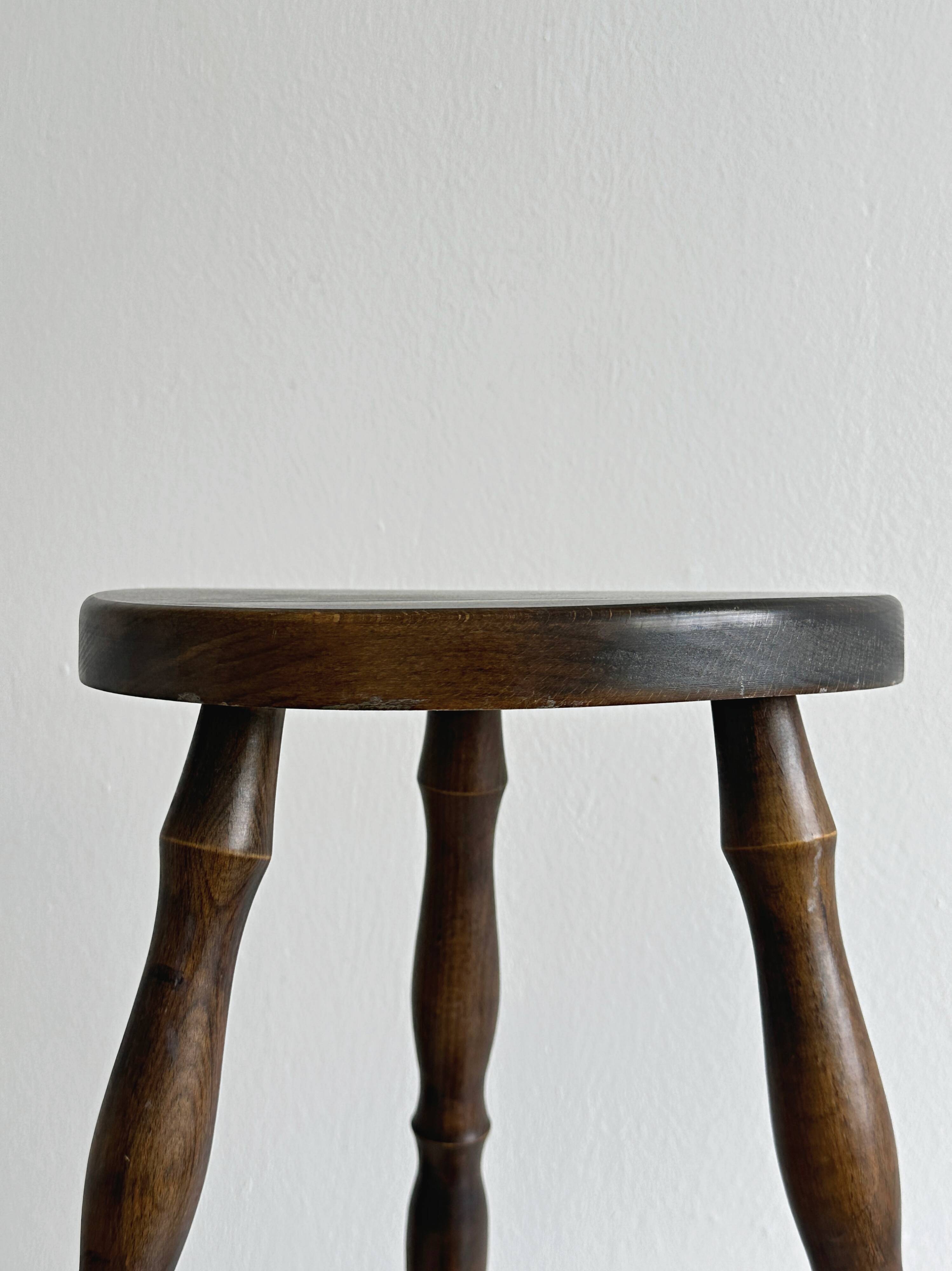 Antique dark wood stool