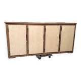Old fridge behind wooden bar