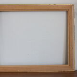 Frame in gilded and green wood