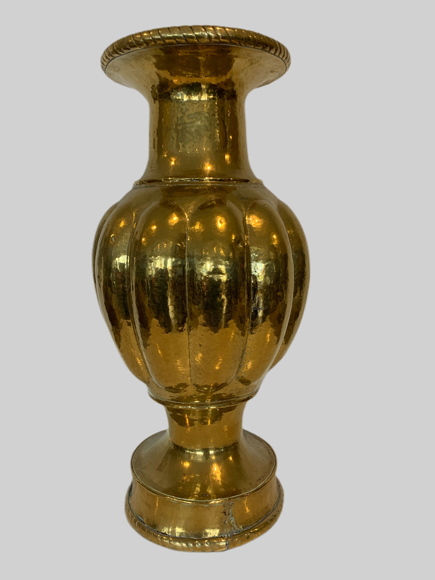 Vase with godrons in hammered brass XX century
