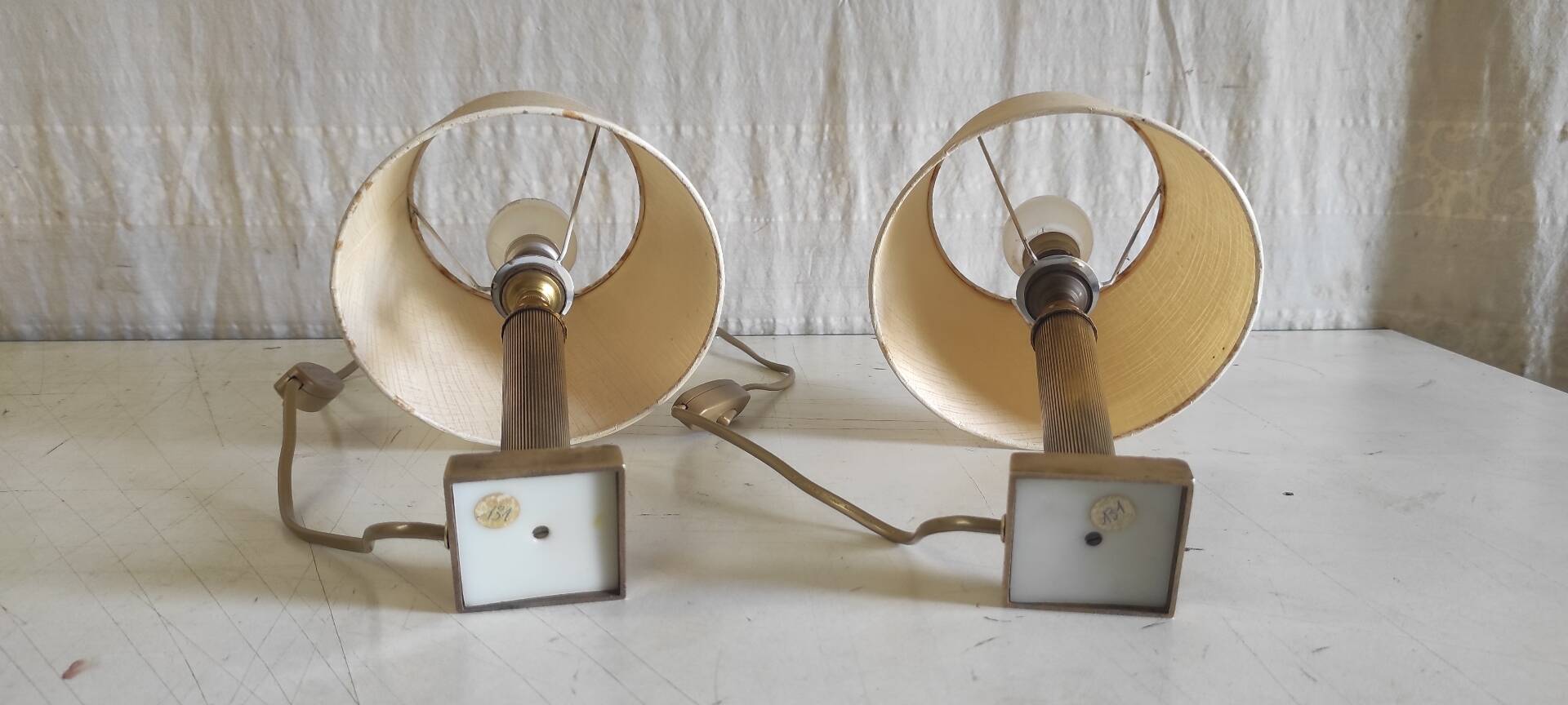 Table lamps in gilded brass with paper shades - mid 20th century.