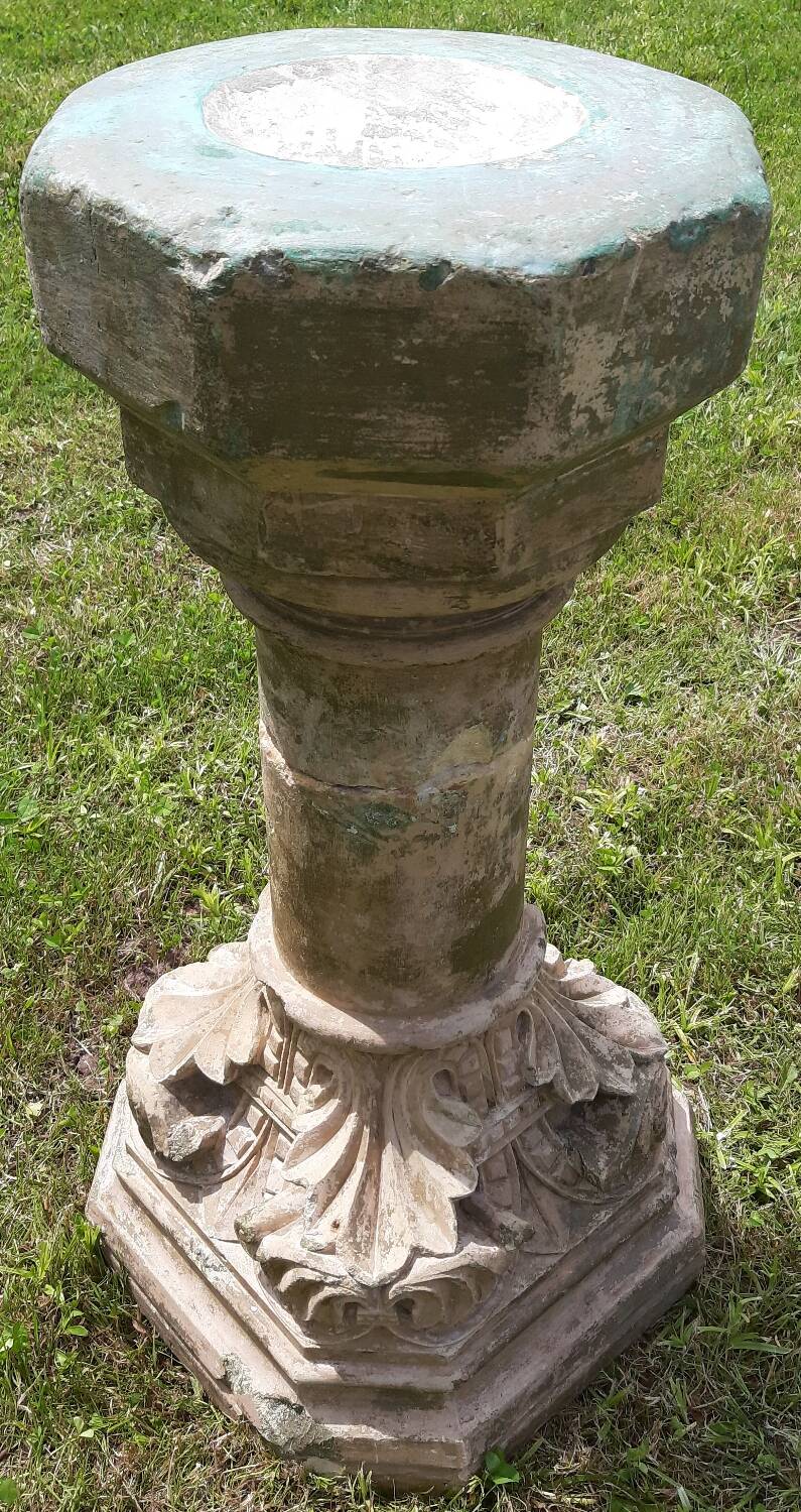 Holy water font on stone column (17th century)