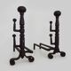 Large pair of wrought iron fireplace andirons. France, 19th century.