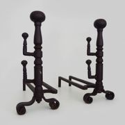 Large pair of wrought iron fireplace andirons. France, 19th century.