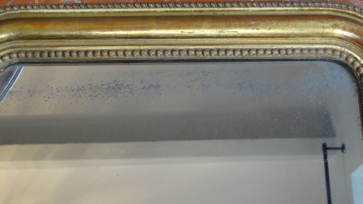 Miroir Louis Philippe en bois doré H 64 cm