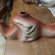 Decorative ceramic vase with organic shapes in Art Nouveau style.