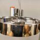 Hanging lamp in chromed metal with orange contrast lacquer and three light sources.