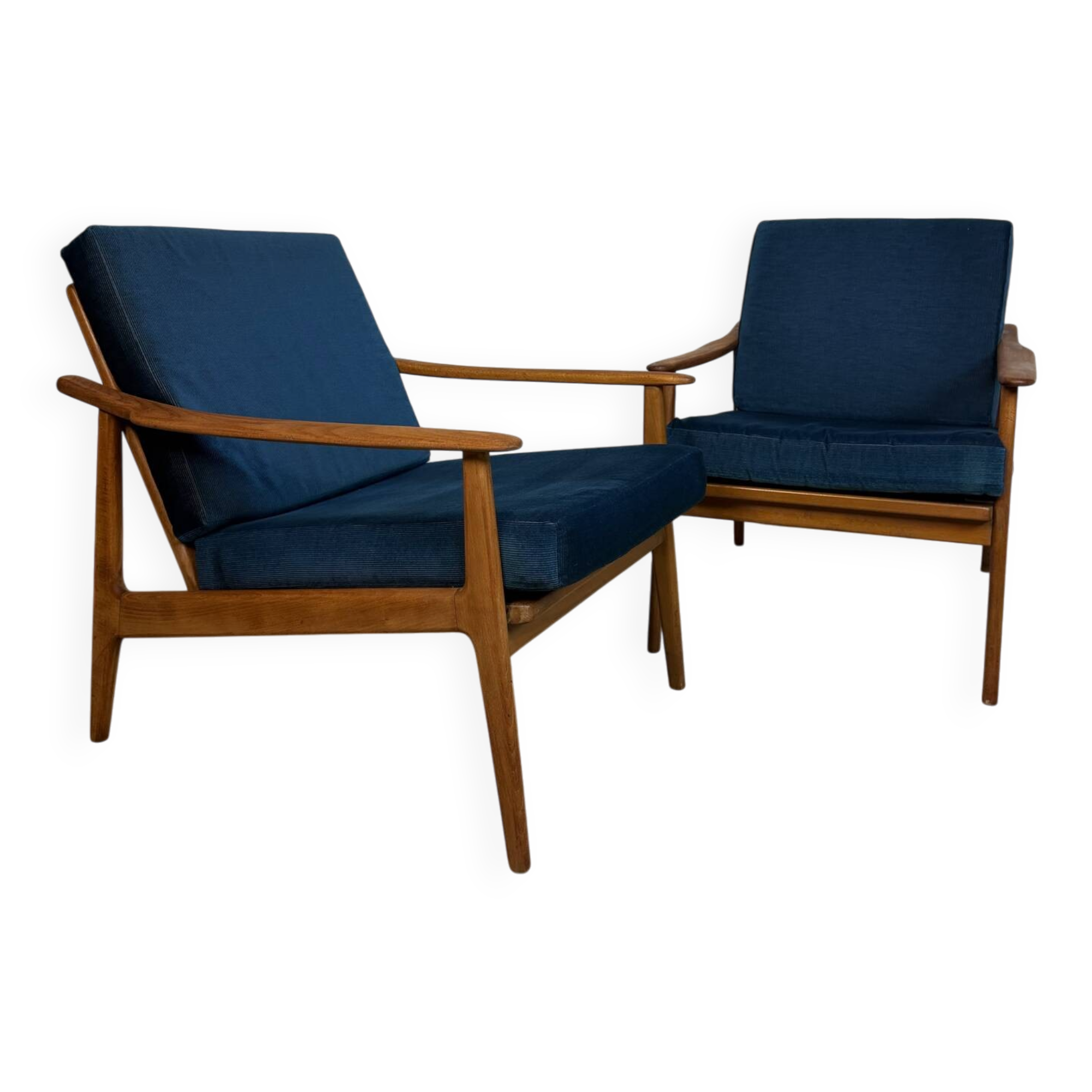a pair of Scandinavian armchairs in teak from the 1960s