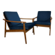 a pair of Scandinavian armchairs in teak from the 1960s