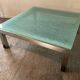 Designer garden coffee table in tempered glass and stainless steel