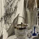 Small golden glass ice bucket with diamond point design and its scoop.