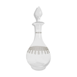 Old wine carafe in glass worked
