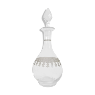 Old wine carafe in glass worked