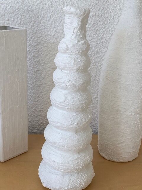 Trio of white vases