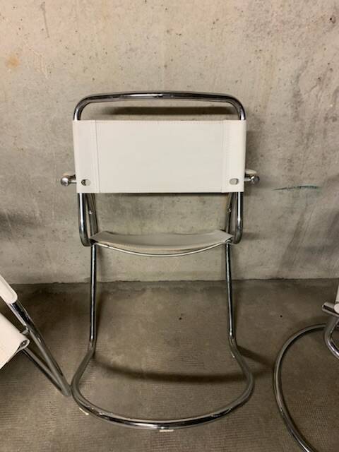 Lot of three vintage tubular armchairs from the 70's