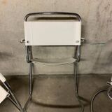 Lot of three vintage tubular armchairs from the 70's