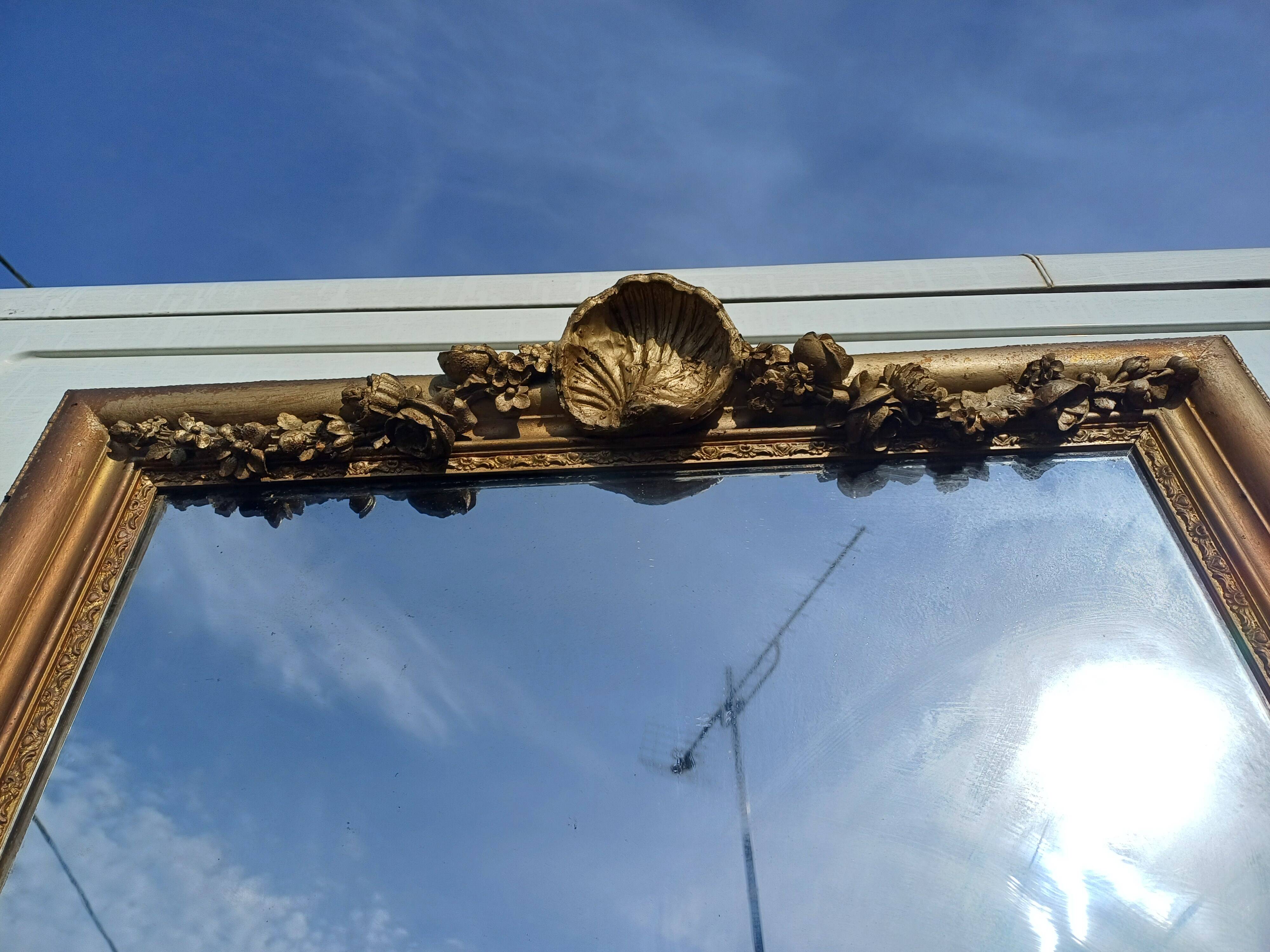 Miroir 19ème bois et stuc doré " coquille st jacques