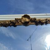 19th century mirror in wood and gilded stucco "scallop shell"