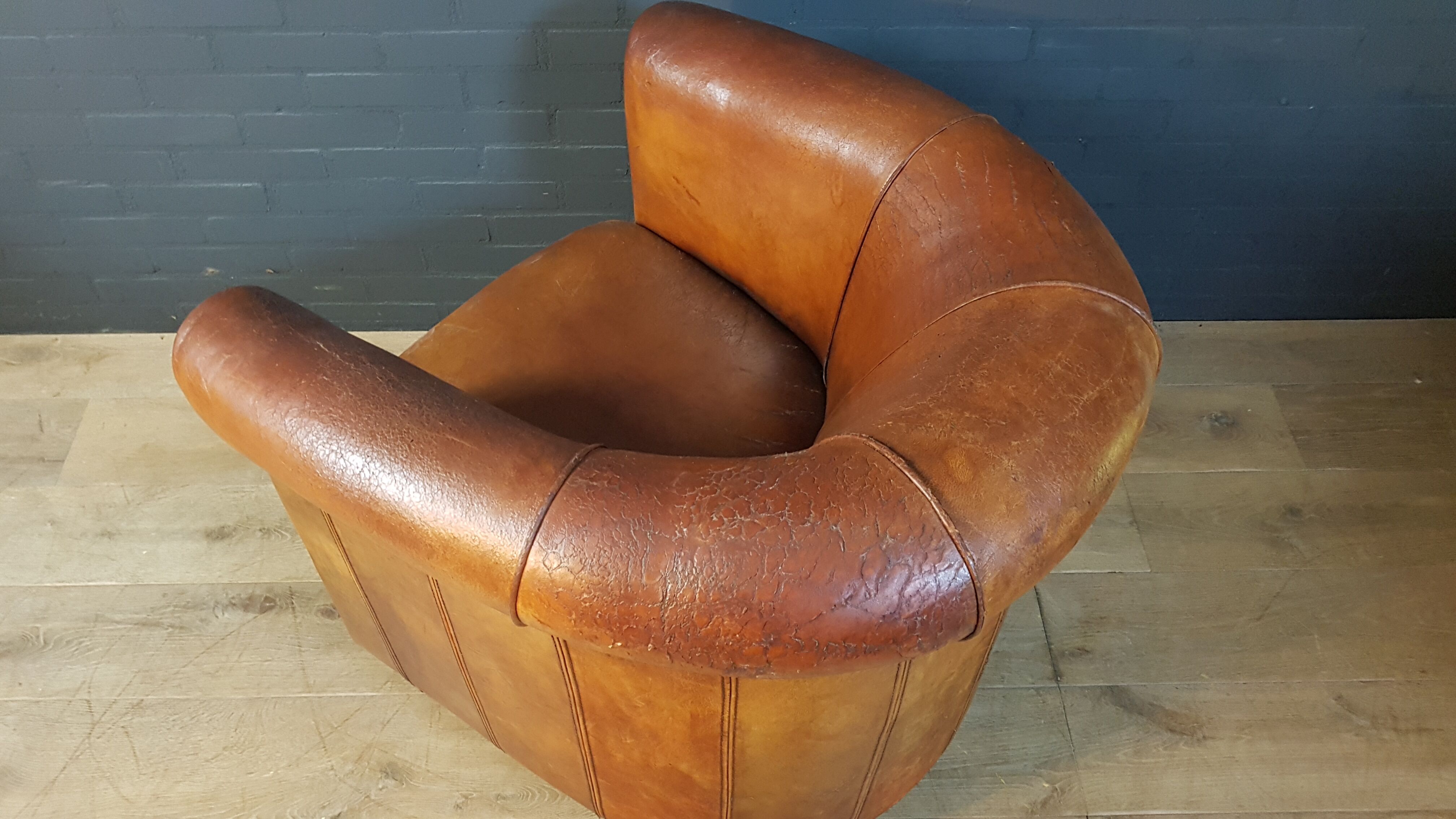 Joris Club chair, made of sheepskin