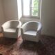 2 white fabric club chairs