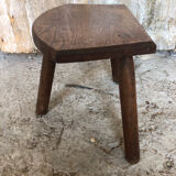 Old vintage wooden tripod milking stool