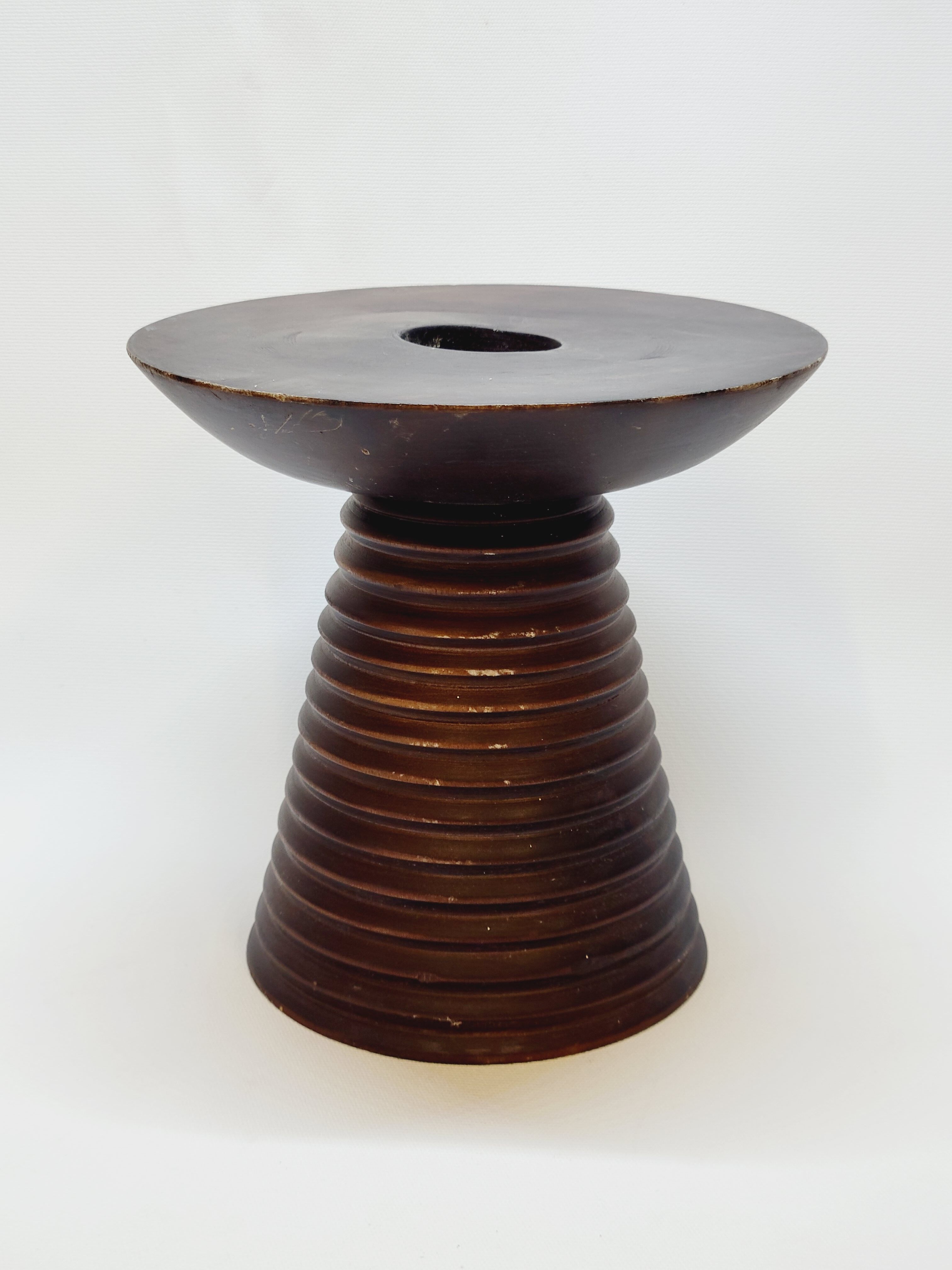 Scandinavian wooden candle holder turned sleek design