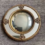 Antique domed witch's eye mirror in gilded wood