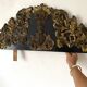 Pediment in blackened wood and 19th century embossed gilded metal foil