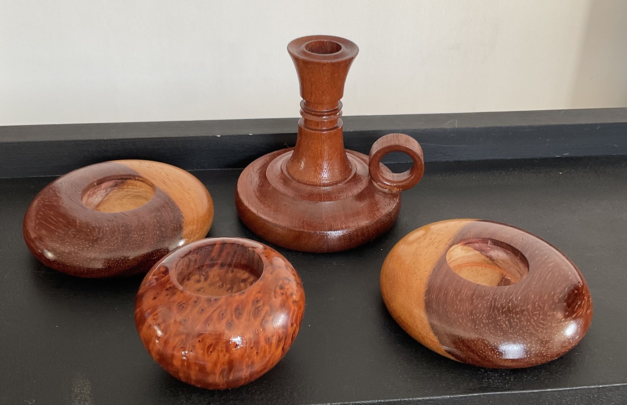 Series of 4 vintage wooden candle holders