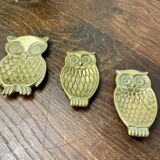 Brass owl emptiers