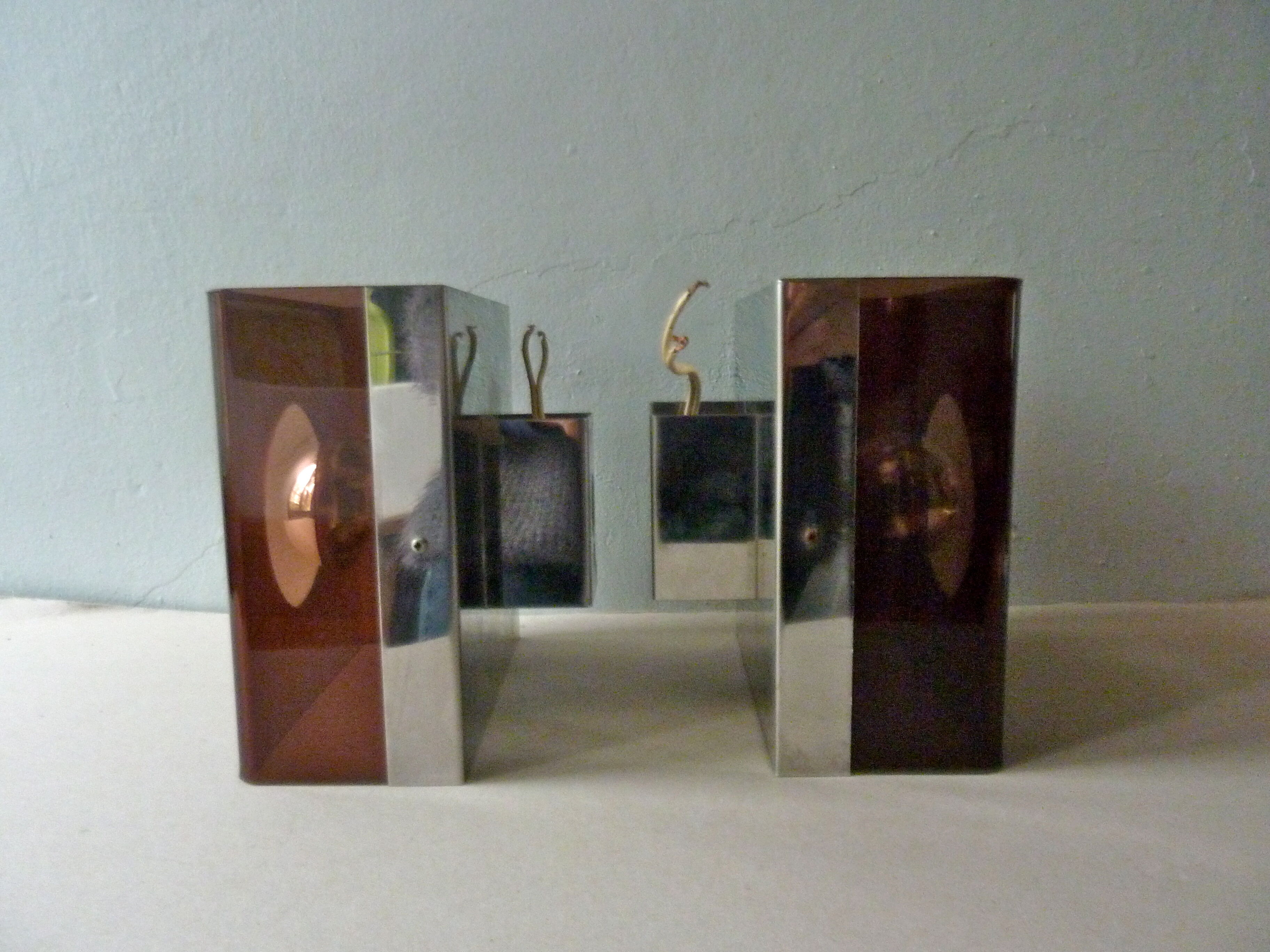 Pair of chromed metal and smoked plexiglass of the 1970s