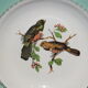 4 vintage hollow plates decorated with birds