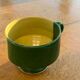 Large bowl in vintage green and yellow enamelled ceramic