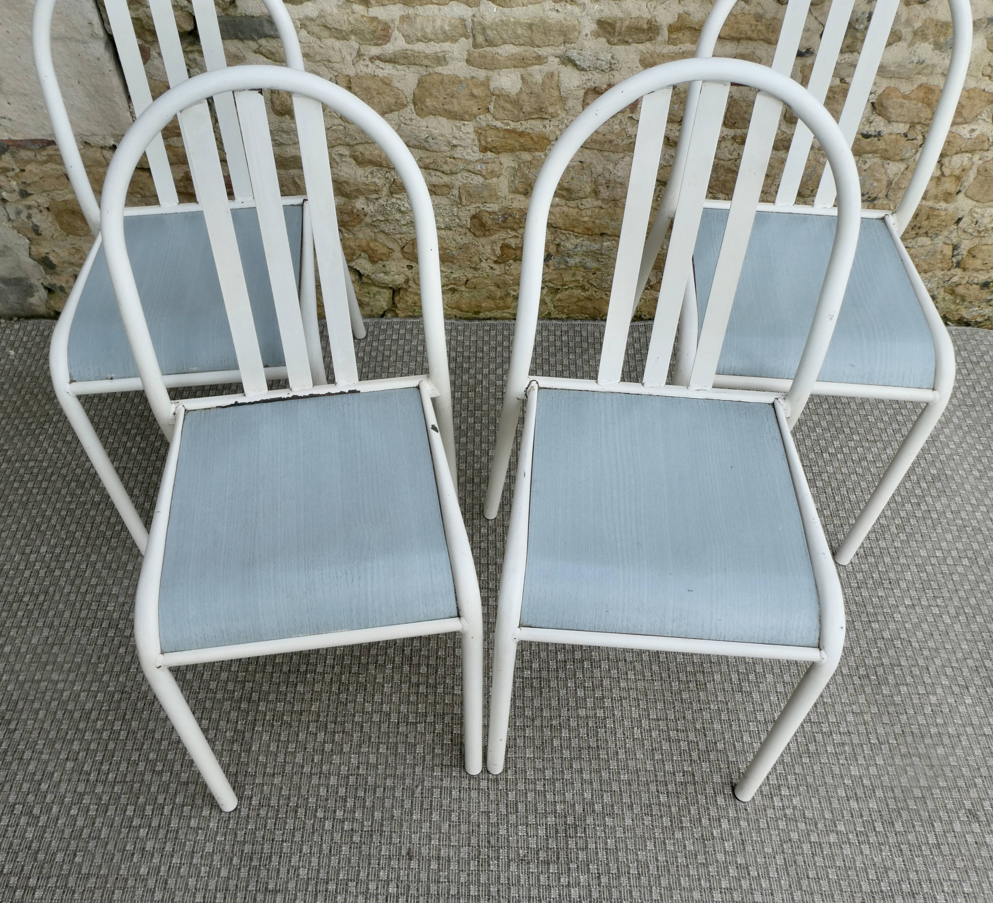 Set of 4 chairs by Robert Mallet-Stevens, 1960s.