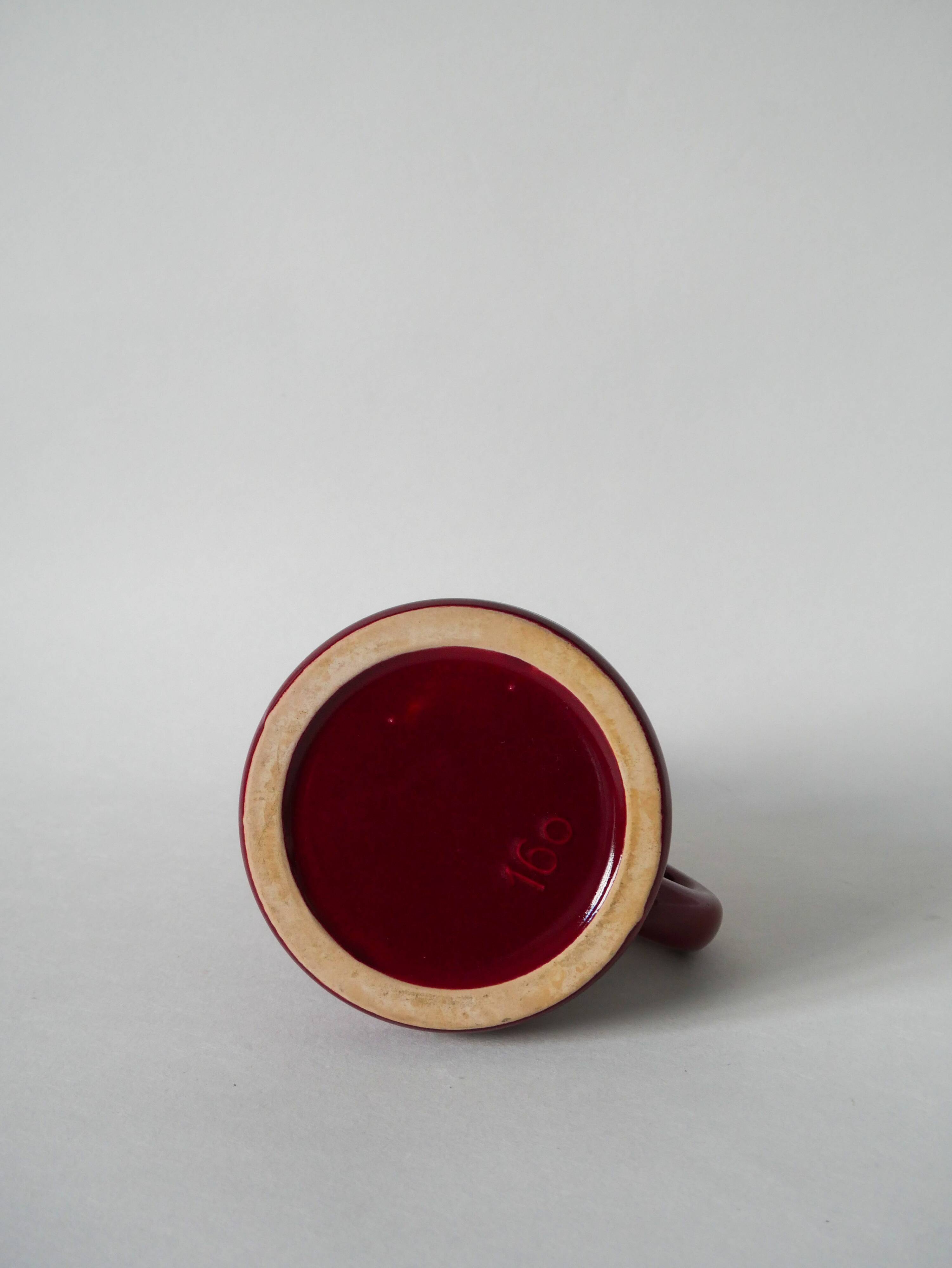 large burgundy ceramic candle holder numbered 1970