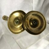Pair of bronze and brass candlesticks