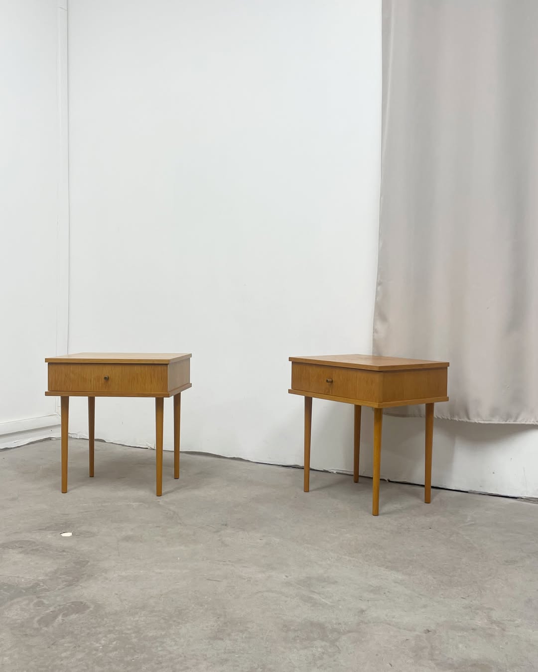 Vintage wooden bedside tables.