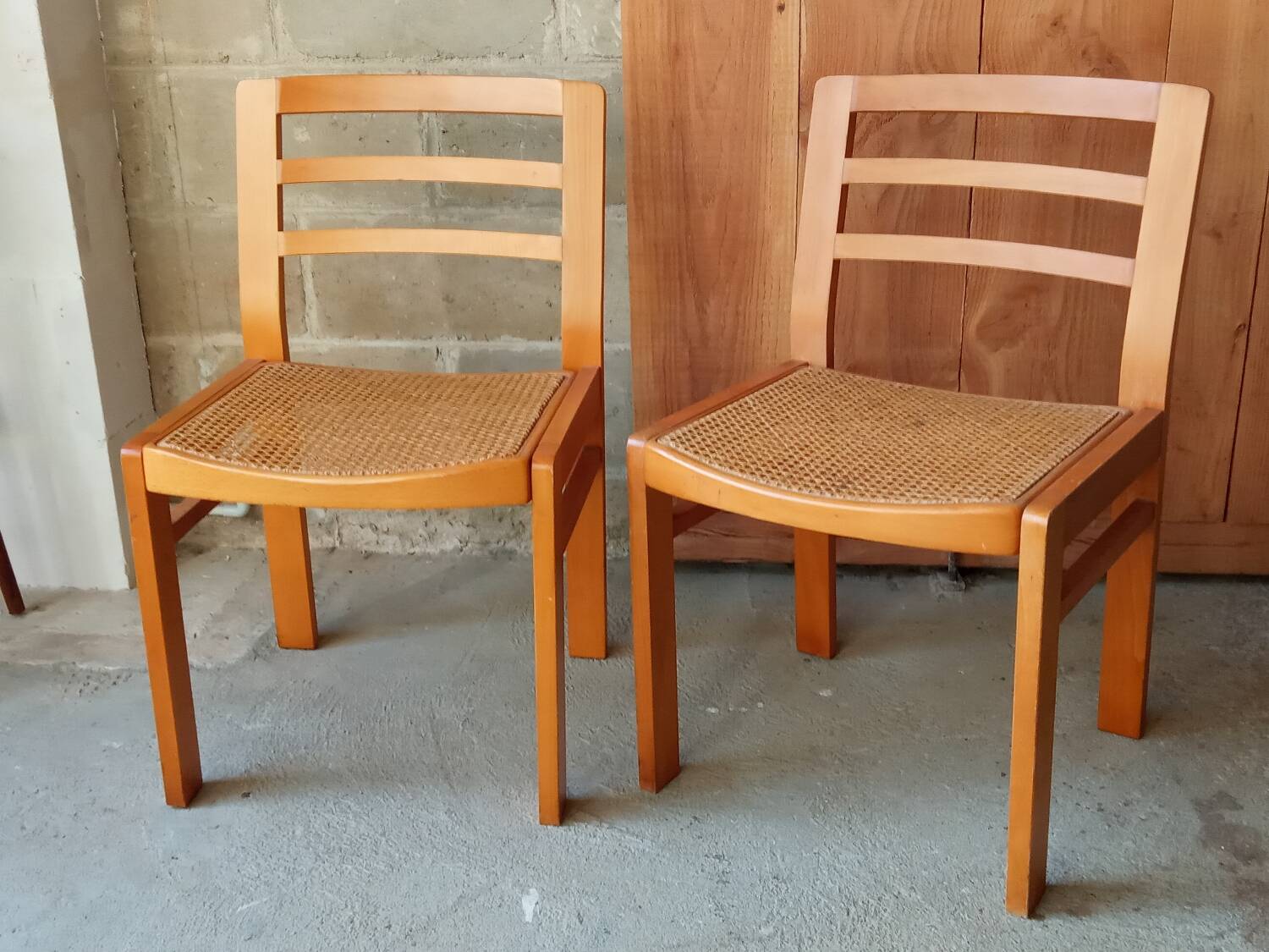 Pair of Baumann caned chairs, 70s/80s