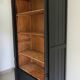 Old library storage unit shelf cabinet curiosities vintage black linen