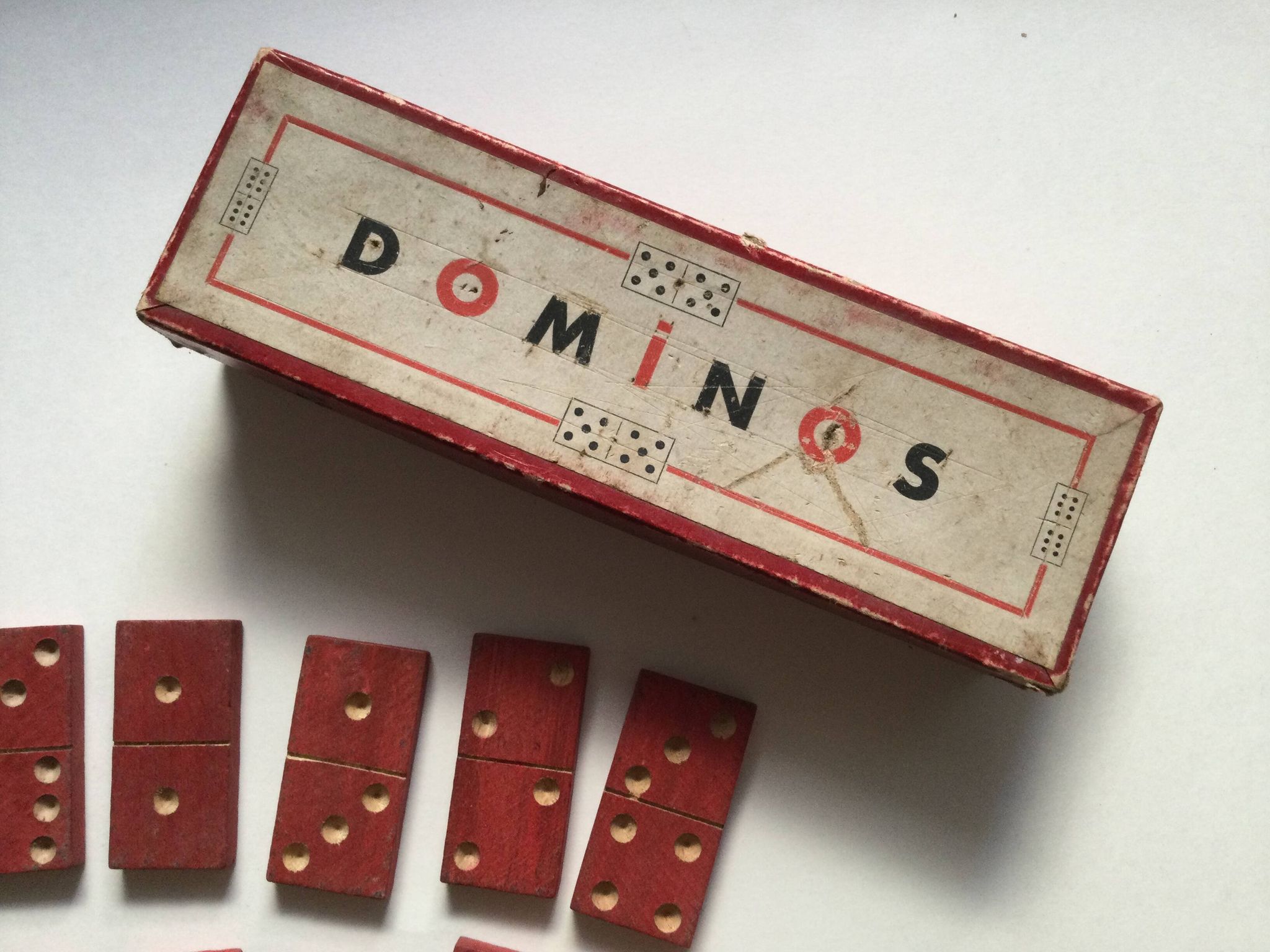 Red wooden dominoes game from the 50s old toy