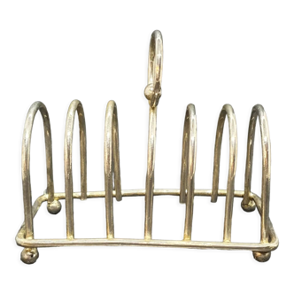Toast holder in silver metal